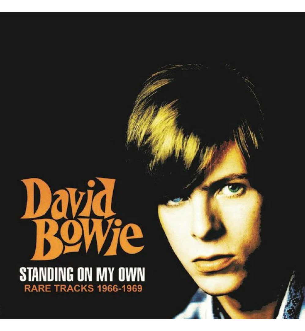 David Bowie’s Standing On My Own: Rare Tracks 1966–1969 vinyl sleeve, featuring an orange-tinted portrait on a black background.